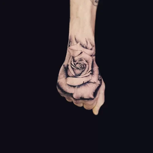 realistic rose hand tattoo detattooshop.nl
